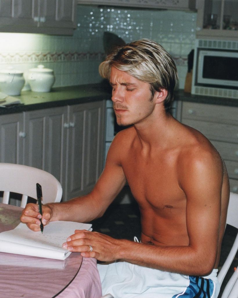 David Beckham writing his wedding vows at kitchen table