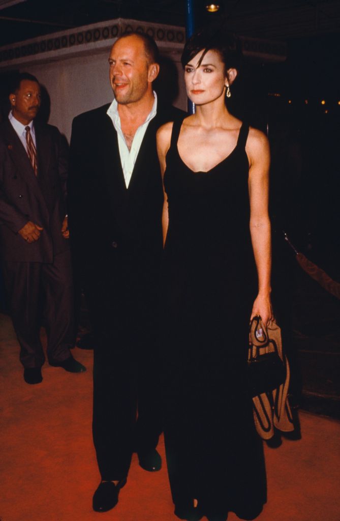 Demi Moore walking with Bruce Willis