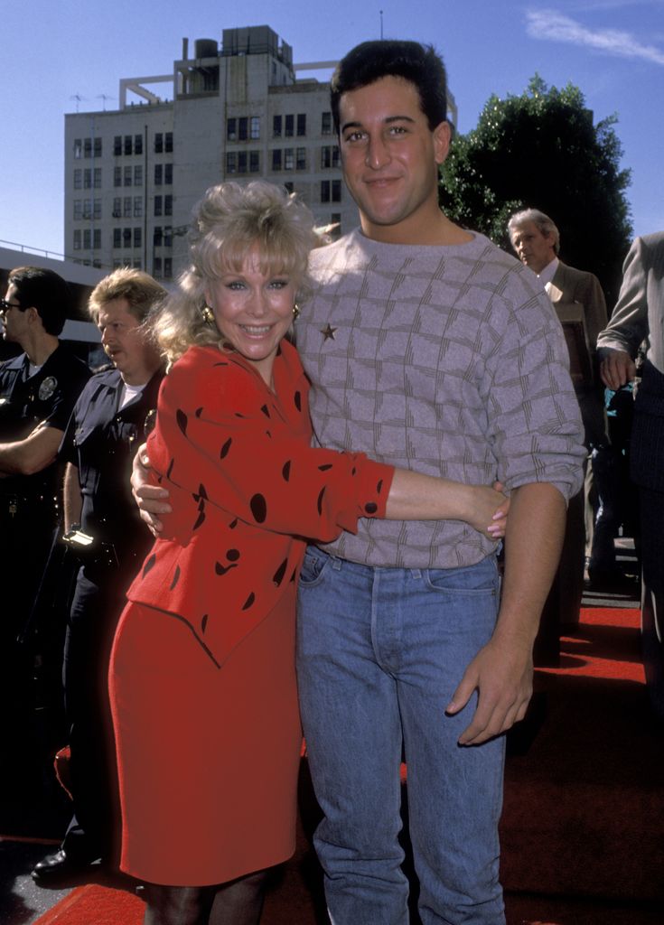 Actress Barbara Eden and son Matthew Ansara standing next to each other 