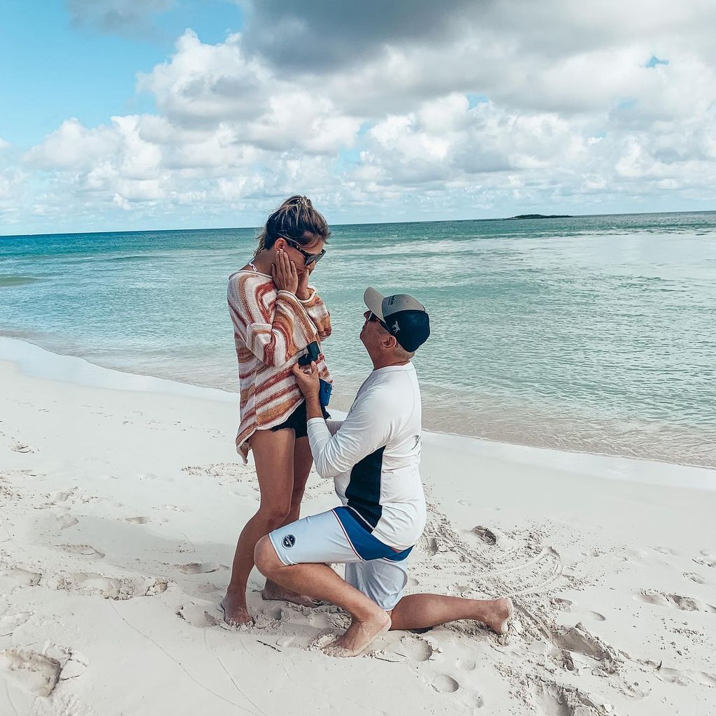 photo of greg biffleon one knee proposing to cristina