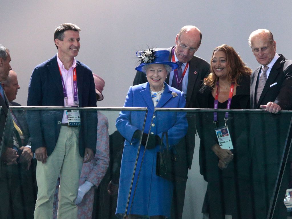 Queen Elizabeth II and Prince Philip, Duke of Edinburgh as they attend the morning competition of the swimming on Day One of the London 2012 Olympic Games