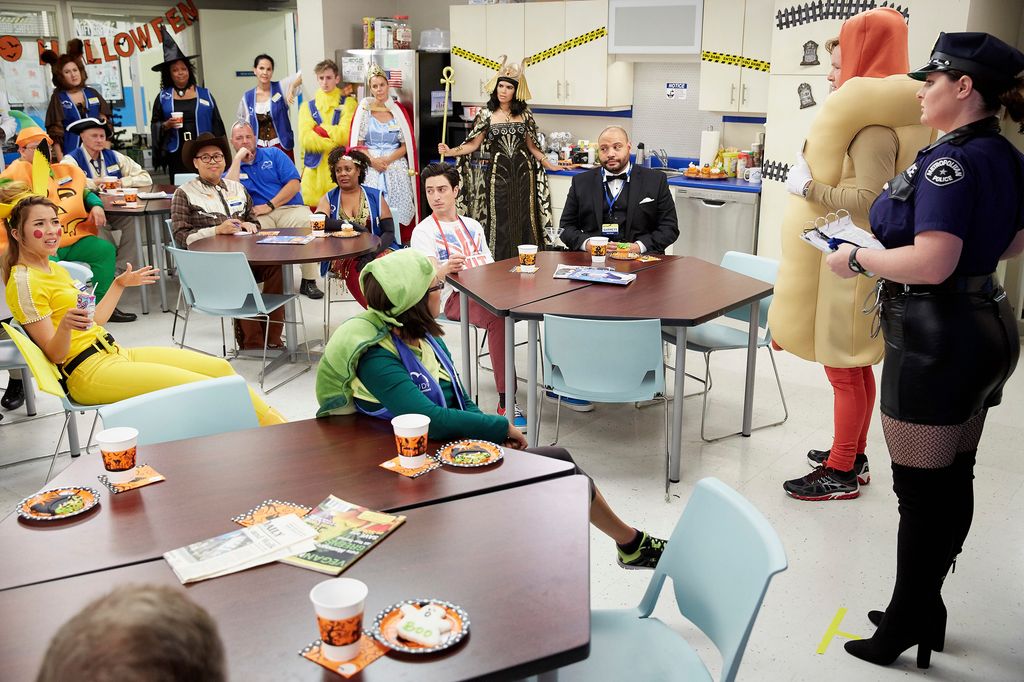 SUPERSTORE -- "Halloween Theft" Episode 207 -- Pictured: (l-r) Nichole Bloom as Cheyenne, Nico Santos as Mateo, Ben Feldman as Jonah, America Ferrera as Amy, Colton Dunn as Garrett, Mark McKinney as Glenn, Lauren Ash as Dina -- (Photo by: Tyler Golden/NBCU Photo Bank/NBCUniversal via Getty Images via Getty Images)
