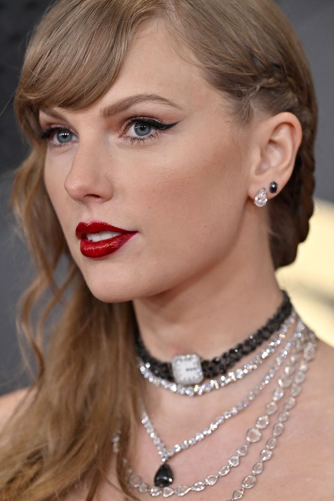 Taylor's set her watch choker to midnight in homage to her Grammy winning album