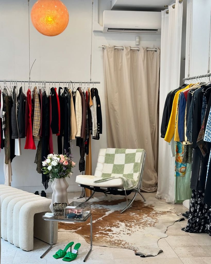 shop with checkered chair and clothes