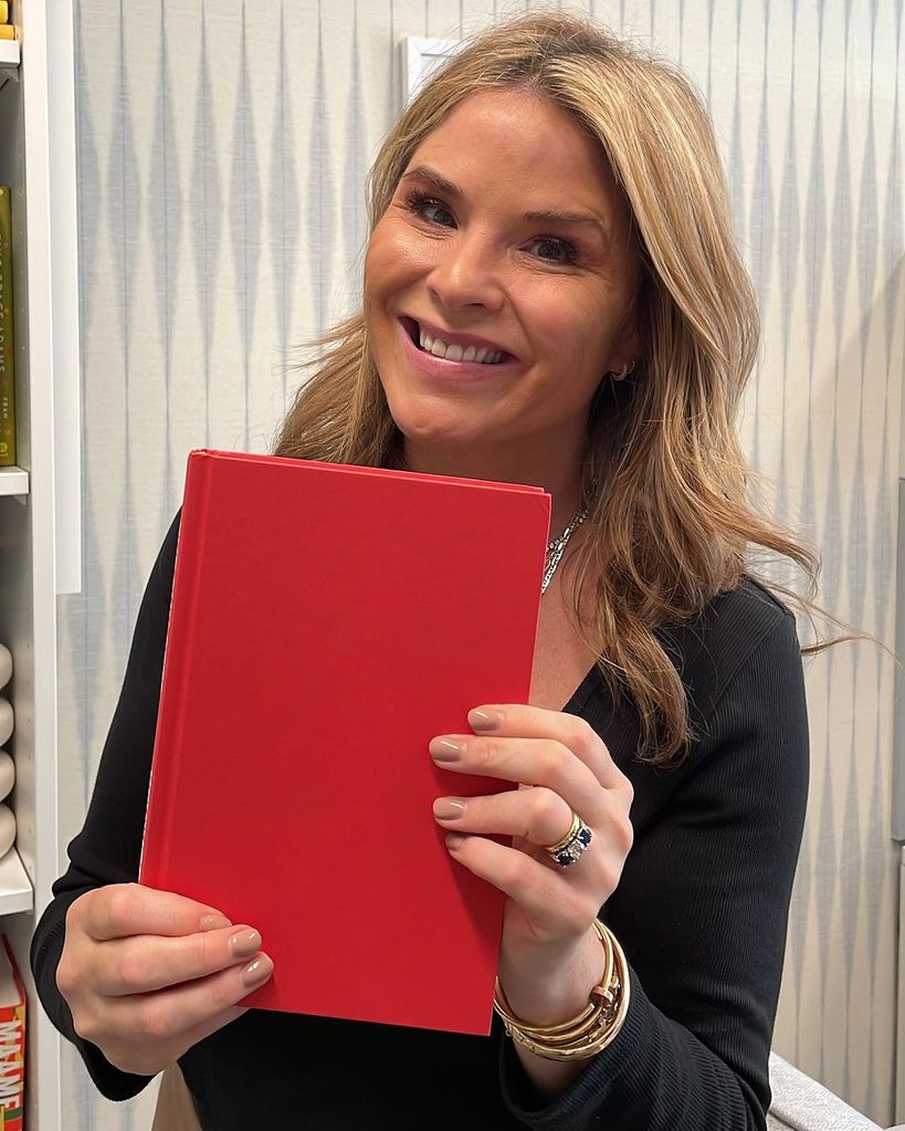 Jenna Bush Hager holding a red book