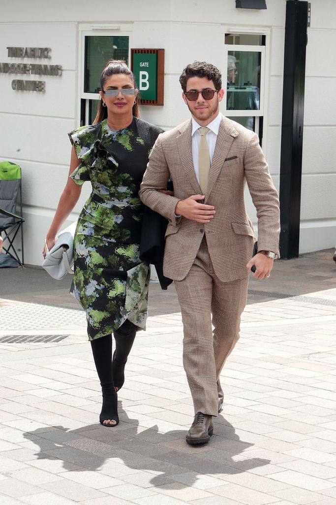 LONDON, ENGLAND - JULY 15: Priyanka Chopra Jonas and Nick Jonas attend day thirteen of the Wimbledon Tennis Championships at All England Lawn Tennis and Croquet Club on July 15, 2023 in London, England. (Photo by Neil Mockford/GC Images)