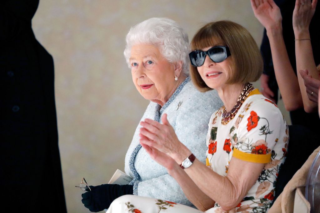 Queen Elizabeth and Anna Wintour sit front row at Richard Quinn's runway show in London.