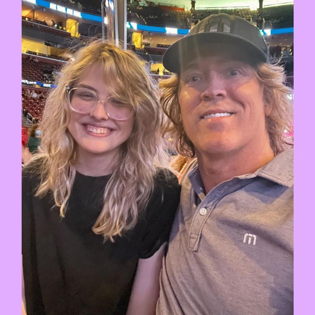 Larry Birkhead and Dannielynn smiling for a selfie at a concert