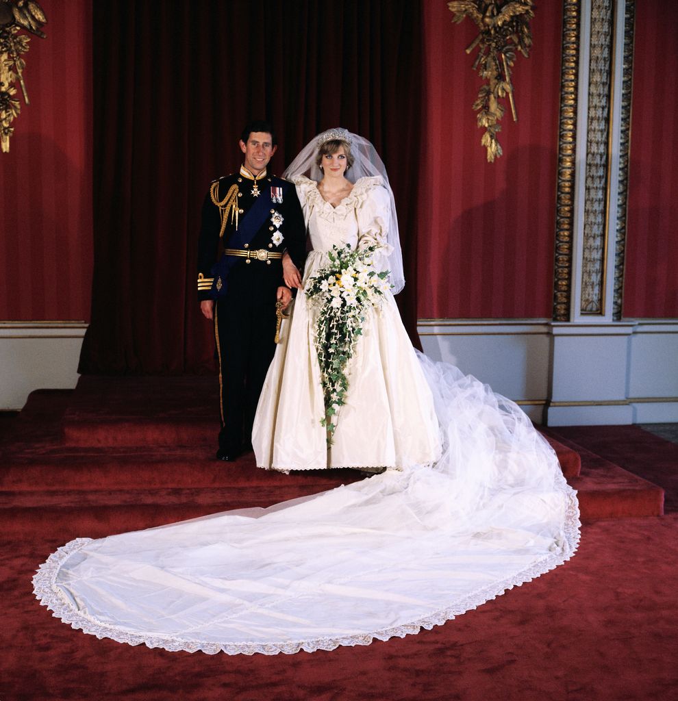 King Charles in military uniform stood with Princess Diana in a wedding dress