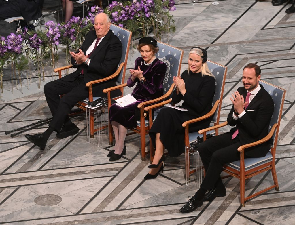 King Harald sitting with Queen Sonja, Crown Princess Mette-Marit and Crown Prince Haakon