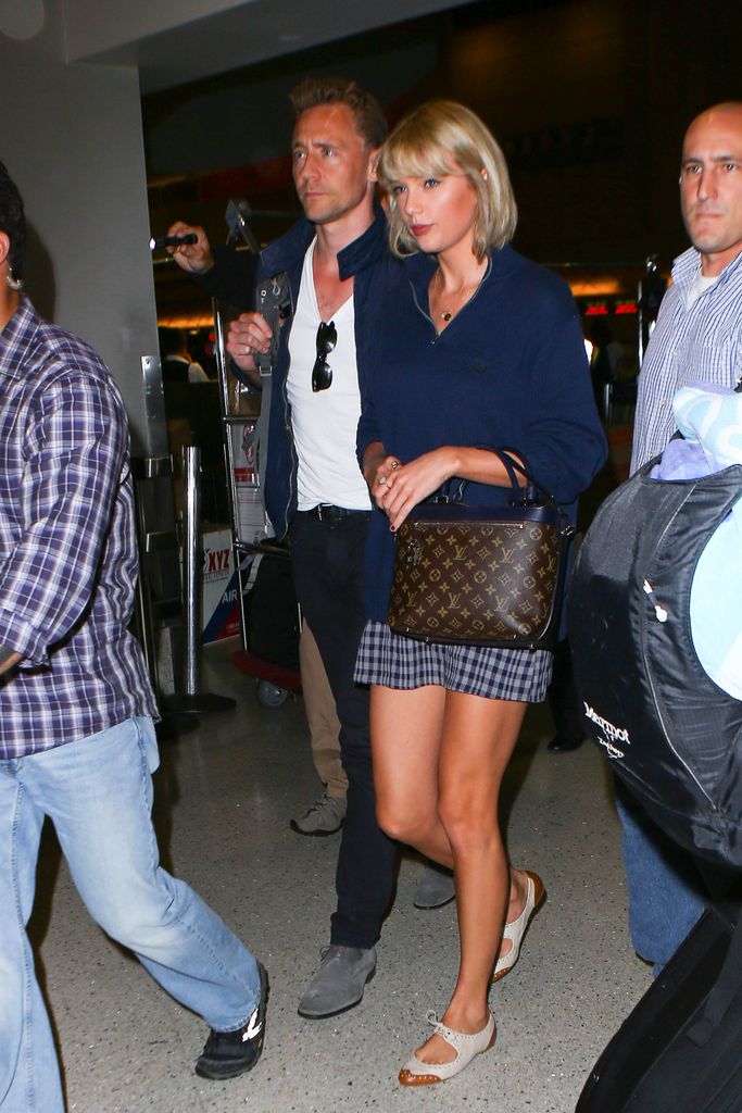 Taylor Swift and Tom Hiddleston are seen at LAX on July 06, 2016 in Los Angeles, California