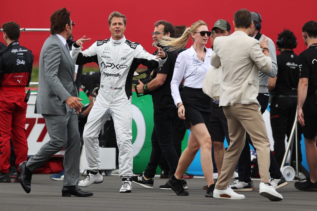 Brad Pitt looks animated at Formula 1 Grand Prix
