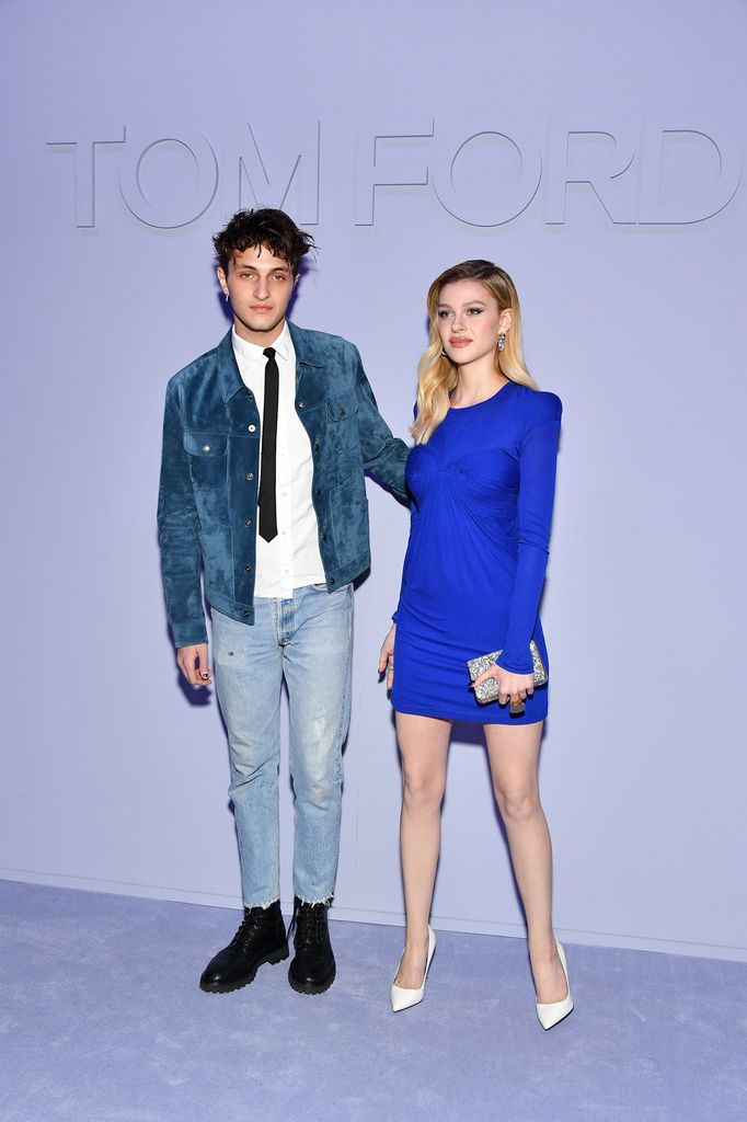  Anwar Hadid (L) and Nicola Peltz attend the Tom Ford Women's Fall/Winter 2018 fashion show during New York Fashion Week at Park Avenue Armory on February 8, 2018 in New York City