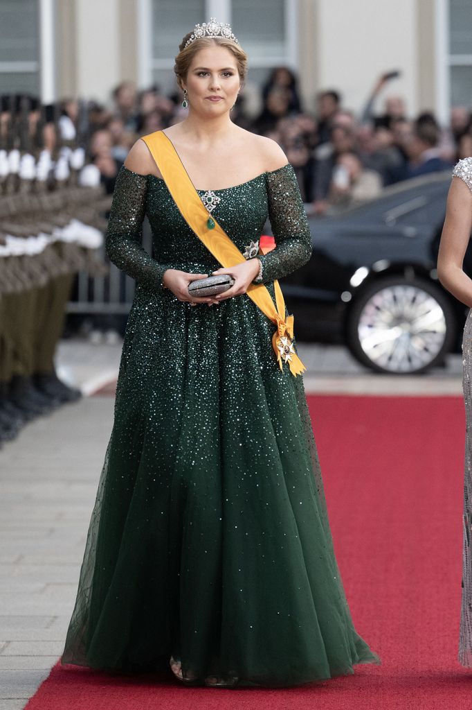 Princess Catharina-Amalia on red carpet in deep green gown