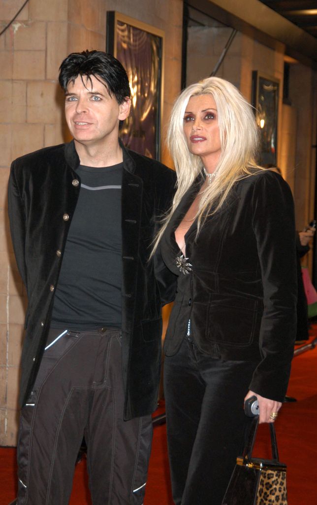 Gary Numan and wife Gemma in matching black outfits