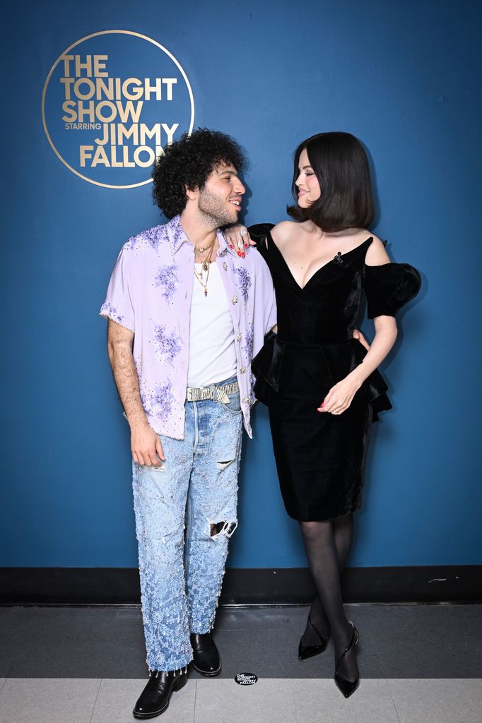 Benny Blanco & singer Selena Gomez facing eachother