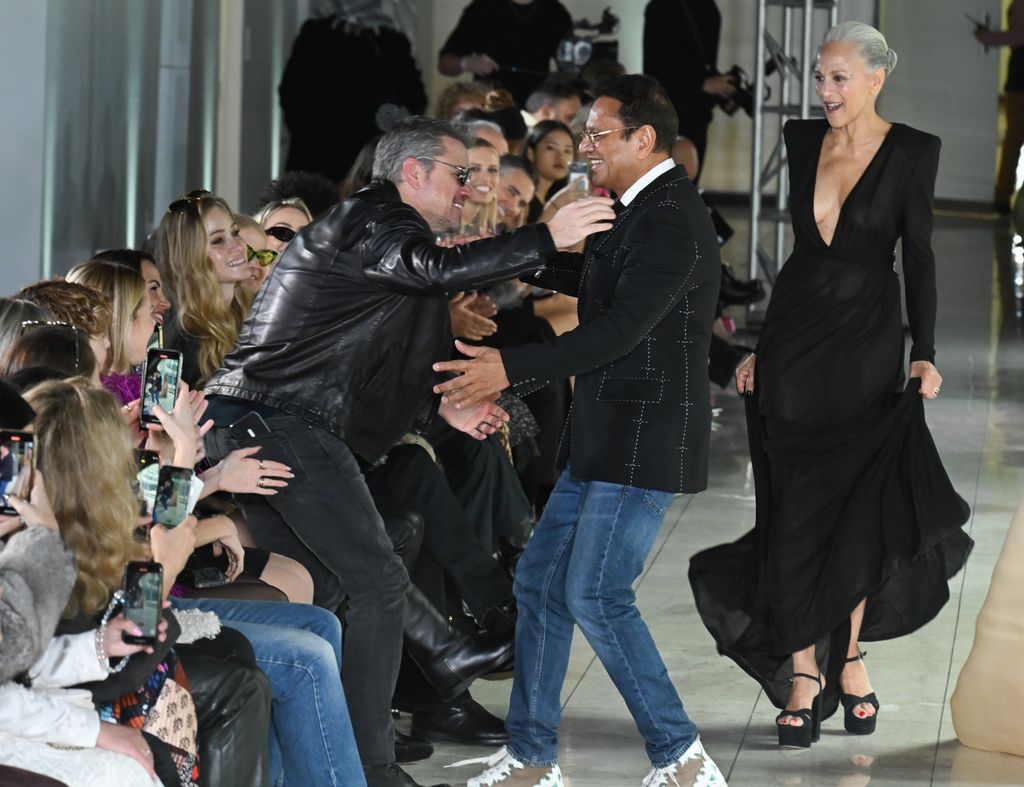 Naeem Khan greets Matt Damon at the Naeem Khan fashion show during February 2024 New York Fashion Week on February 12, 2024 in New York 