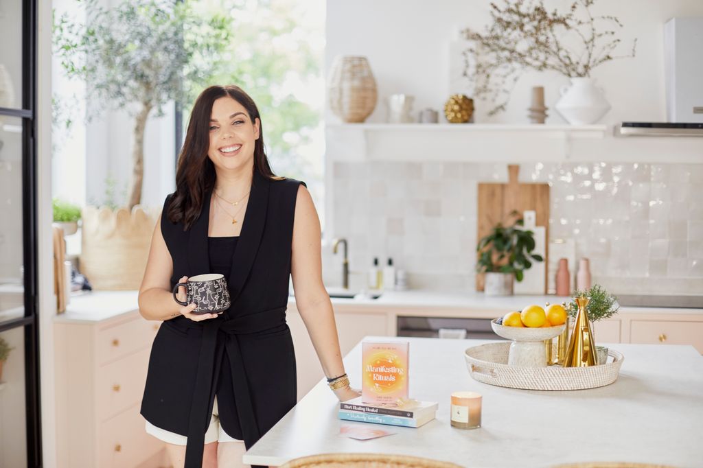 Best-selling author Emma poses with some of her books