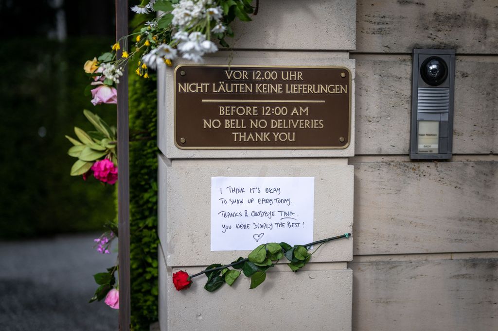 A red rose and a message are taped at the Chateau Algonquin gate leading to into the estate of late singer Tina Turner 