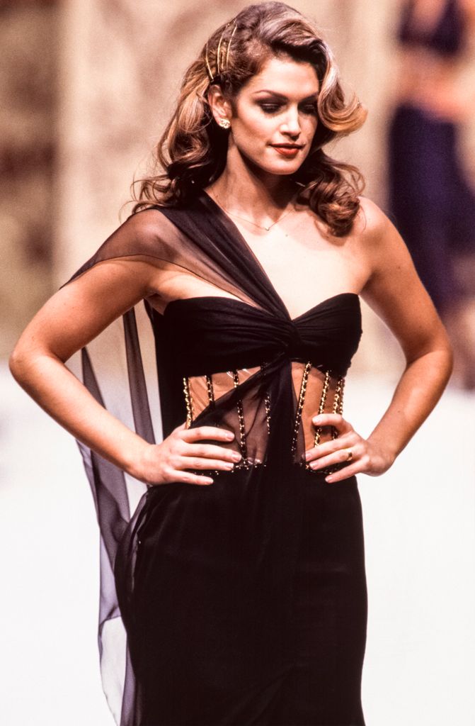 Cindy Crawford walking the runway at the Chanel Haute Couture Spring/Summer 1993 fashion show during the Paris Fashion Week