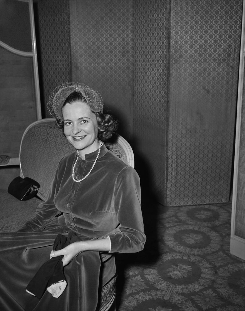 Black-and-white photo of Queen Geraldine sitting in a velvet dress