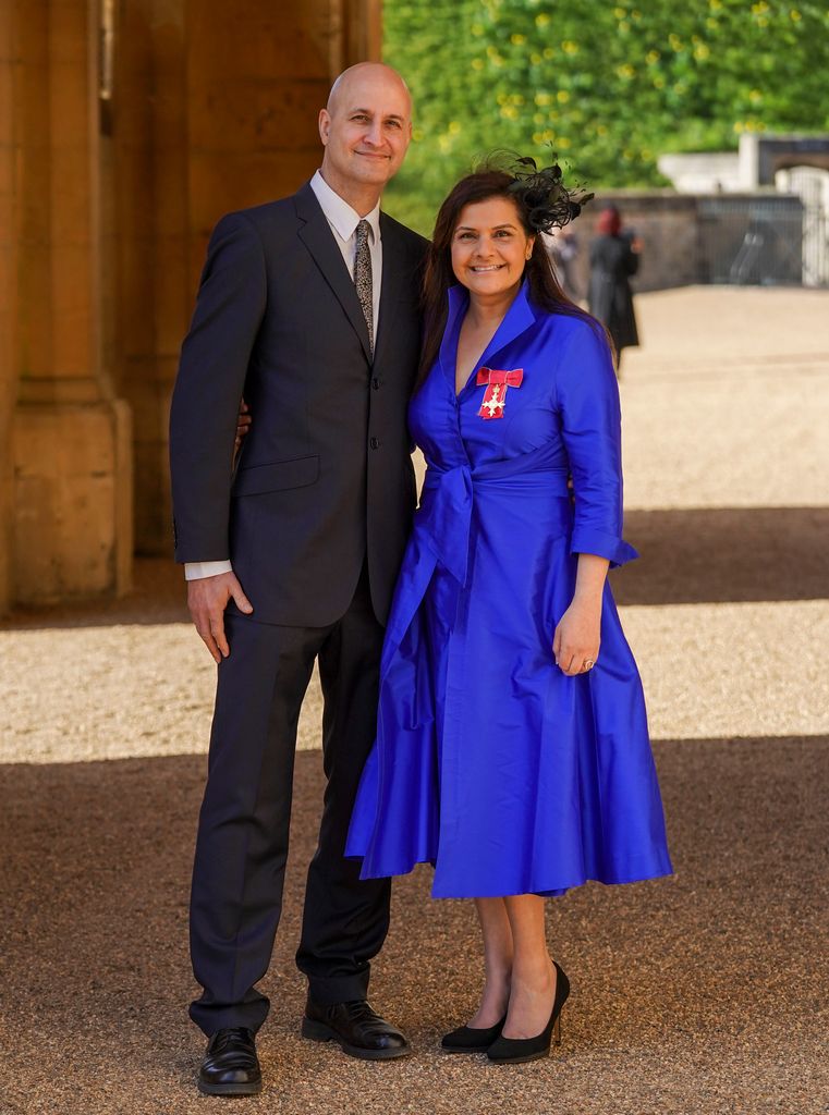 Nina Wadia in a blue dress with her husband Raiomond Mirza