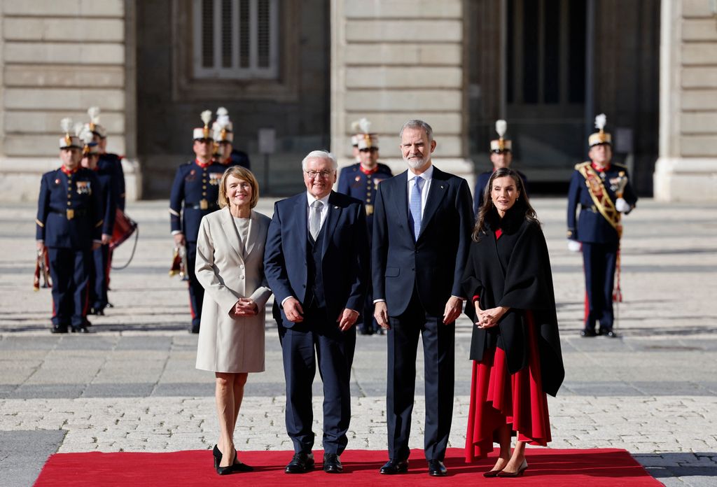 German President Frank-Walter Steinmeier and his wife Elke Budenbender (L),  Spain's King Felipe VI (2R) and Queen Letizia (R) attend a welcome ceremony with military honors on the first day of a State visit to Spain, in Madrid on November 26, 2025