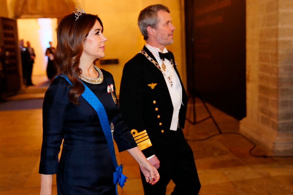 King Frederik X of Denmark (R) and Queen Mary of Denmark attend a state banquet with a concert at St. Nicholas Church in Tallinn, Estonia