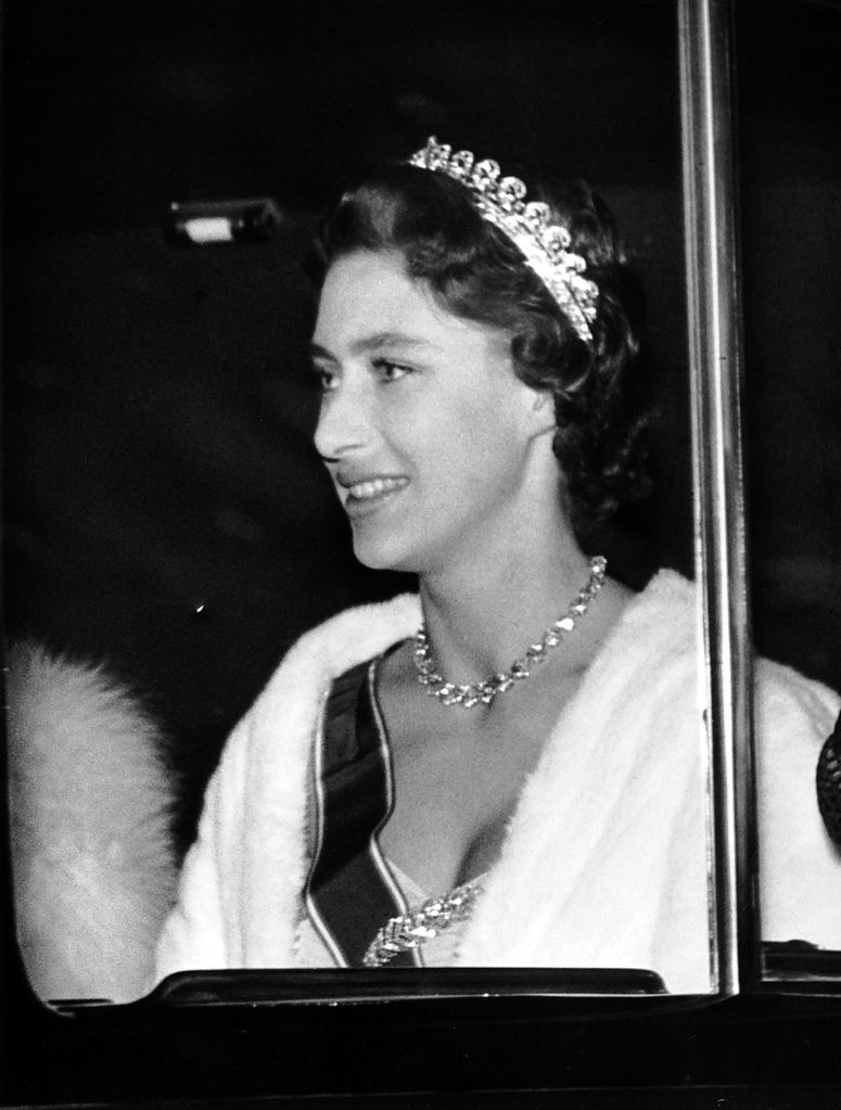 Princess Margaret in the Cartier Halo tiara for a dinner in 1955