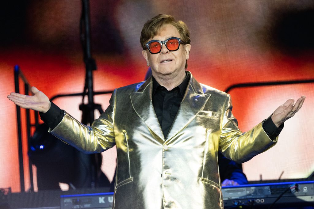 Sir Elton John looks out over the audience as performs on The Pyramid Stage at Day 5 of Glastonbury Festival 2023 on June 25, 2023 in Glastonbury, England