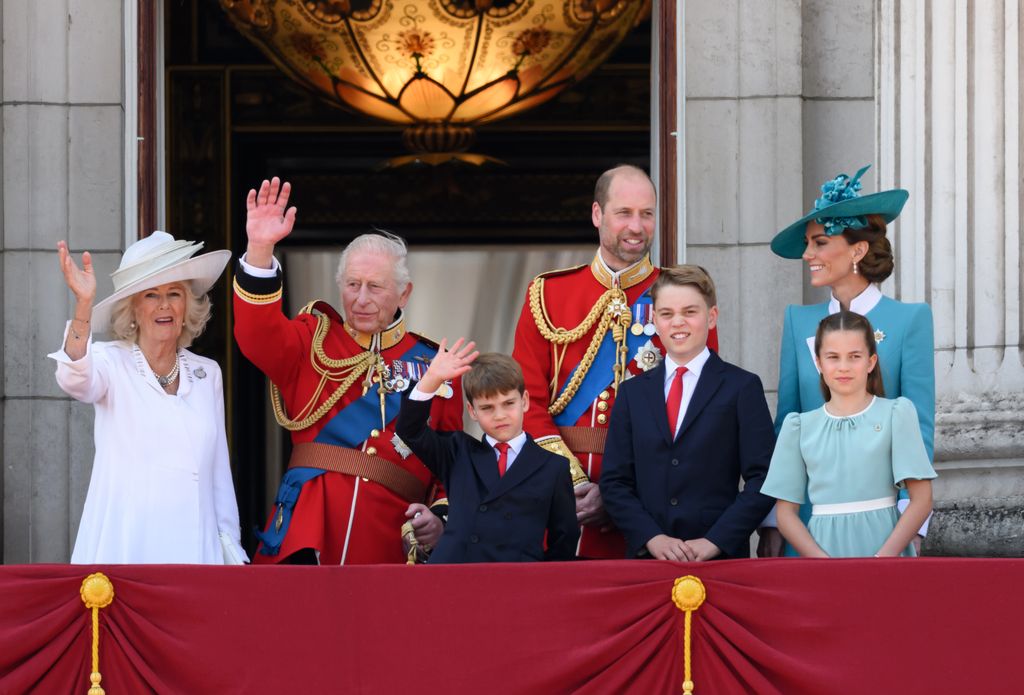 Queen Camilla, King Charles, Prince Louis, Prince William, Prince George, the Princess of Wales and Princess Charlotte on the balcony at Buckingham Palace