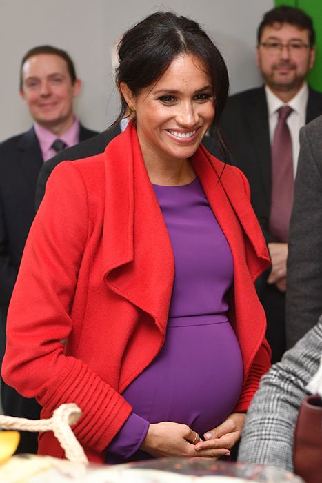 meghan markle baby bump in purple dress