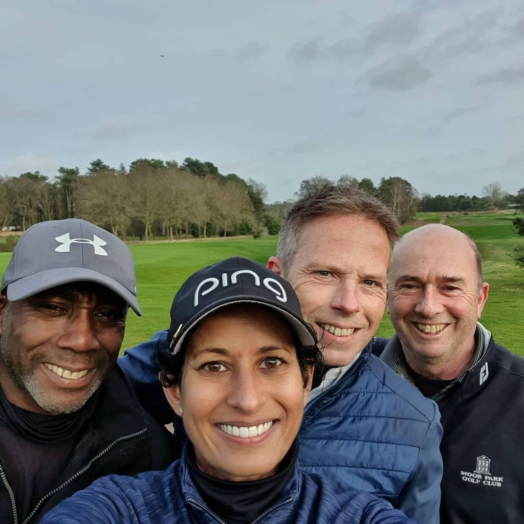 Naga Munchetty and her husband James with friends on golf course, close-up