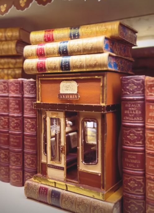 A book end in the shape of a train carriage