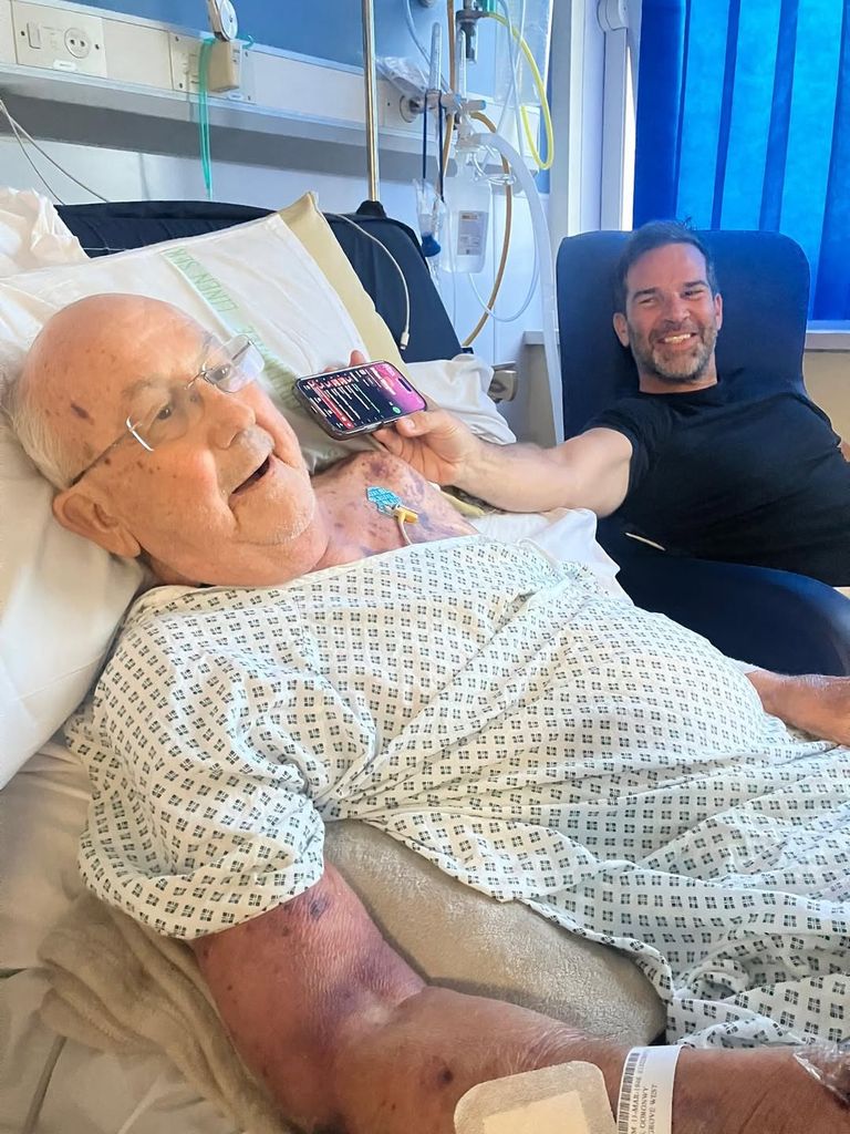 Gethin Jones with his dad in hospital bed