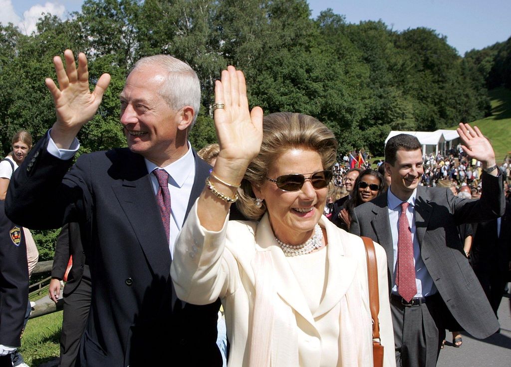 Prince Hans-Adam, Countess Marie and Prince Alois waving at crowds