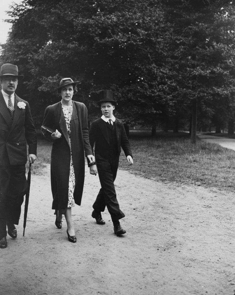 Albert Spencer, 7th Earl Spencer (1892 - 1975) with his wife Cynthia and their son Edward John Spencer at Eton College, 4th June 1937. John would grow up to father Diana Spencer, the Princess of Wales. (Photo by Topical Press Agency/Hulton Archive/Getty Images)