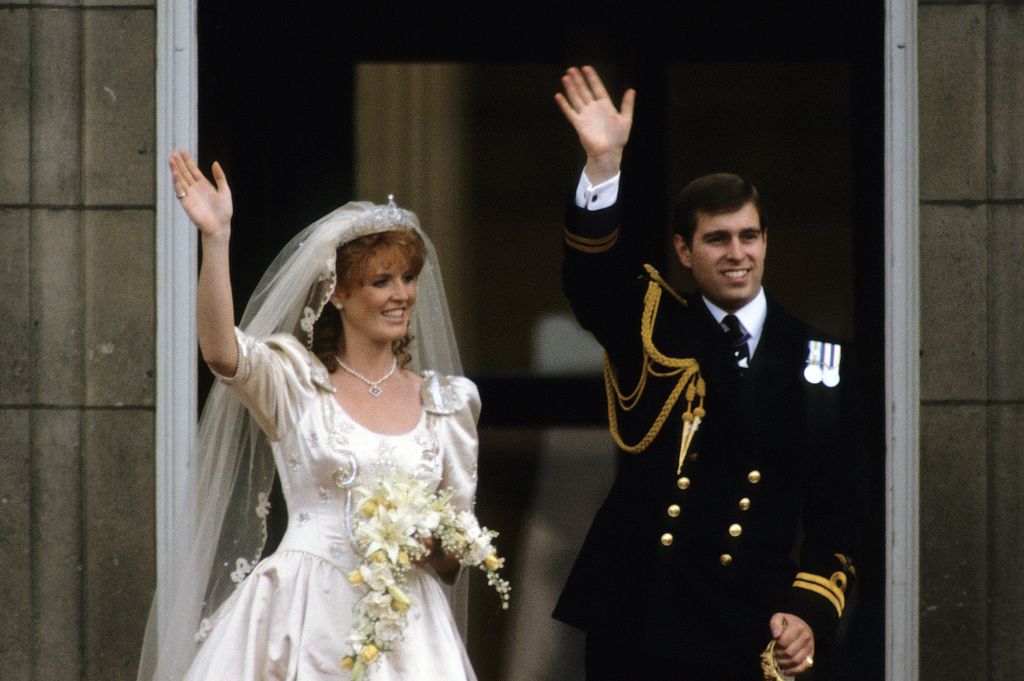 Sarah Ferguson and Prince Andrew waving from a balcony