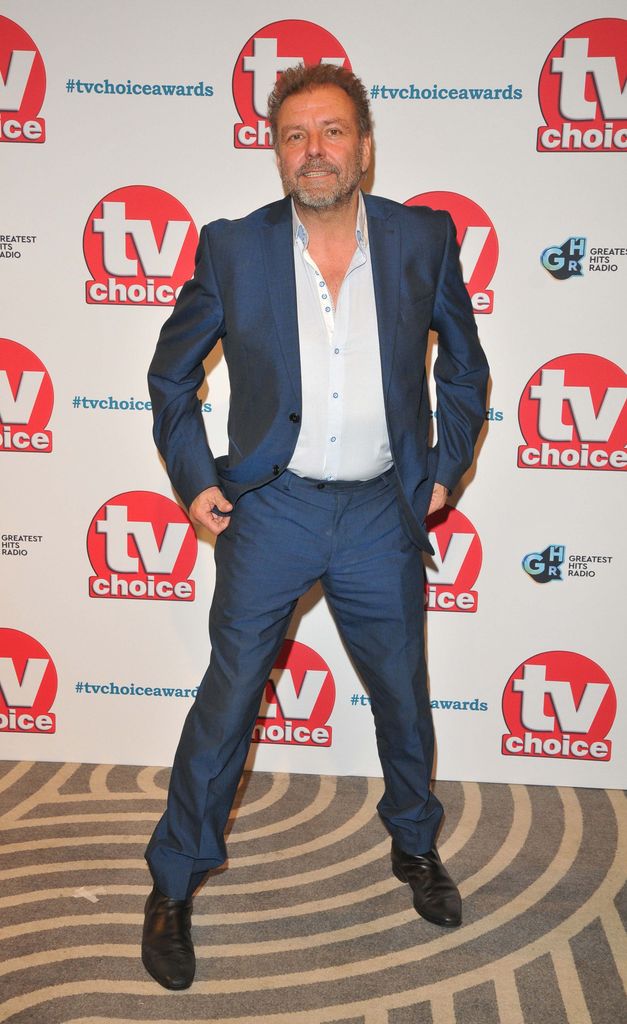 Martin Roberts in a blue suit