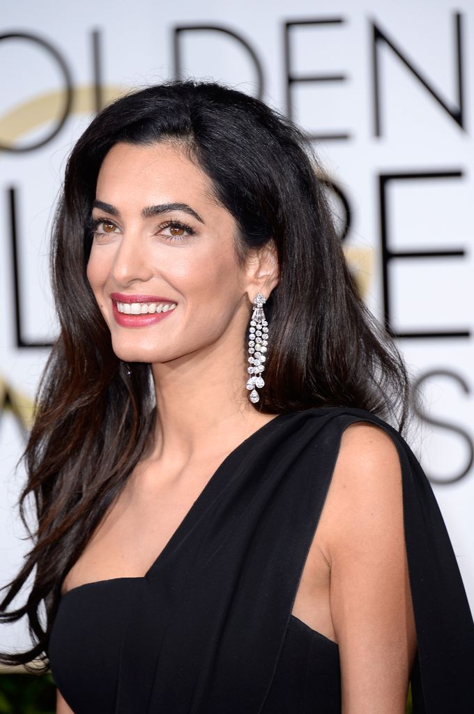 Lawyer Amal Clooney arrives to the 72nd Annual Golden Globe Awards held at the Beverly Hilton Hotel on January 11, 2015