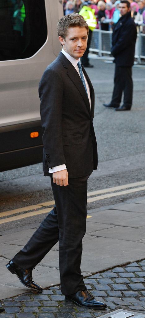 Hugh Grosvenor in a suit