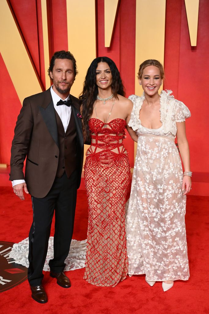 Matthew McConaughey, Camila Alves and Jennifer Lawrence attend the 2024 Vanity Fair Oscar Party hosted by Radhika Jones at Wallis Annenberg Center for the Performing Arts on March 10, 2024 in Beverly Hills, California