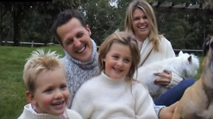 A father and mother with two children and two dogs