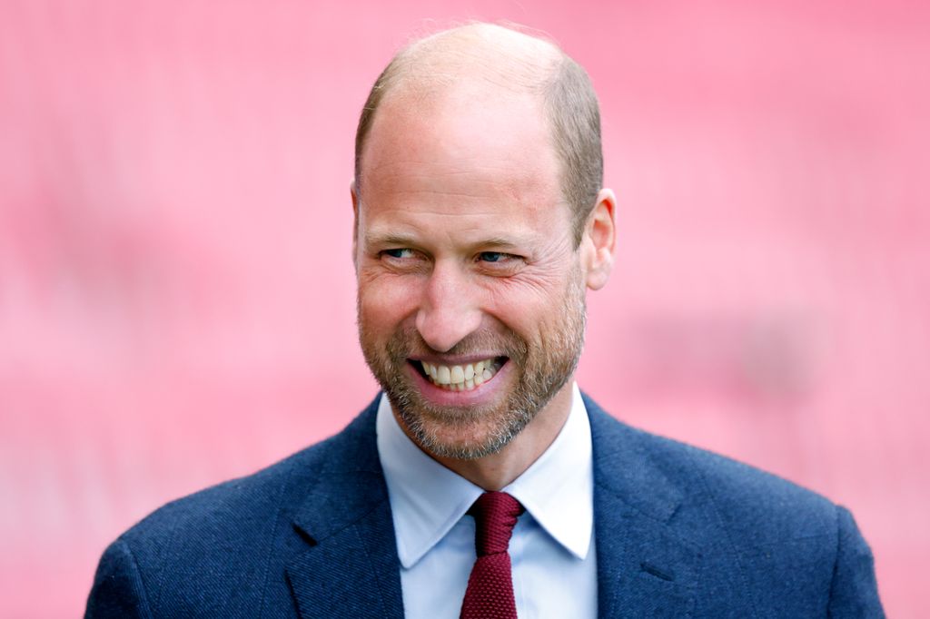 prince william in suit smiling