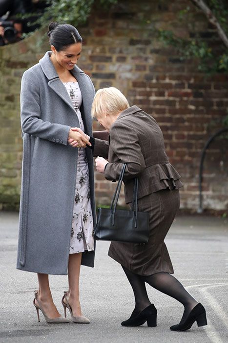 meghan markle care home curtsy