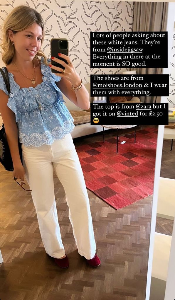 A photo of Carrie Johnson wearing white jeans and a blue top