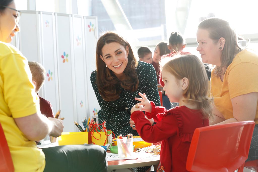 Kate joins some of the children as they take part in Christmas-themed activities during a visit to Evelina London Children's Hospital 