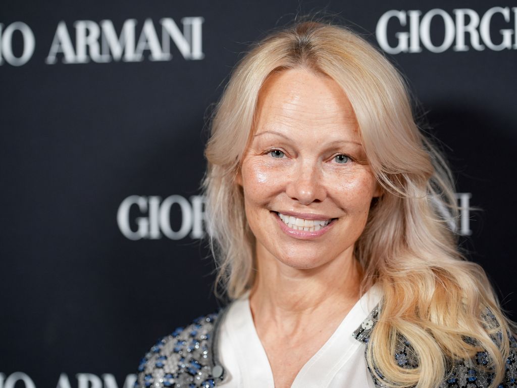 Pamela Anderson at the Giorgio Armani RTW Spring 2025 fashion show held at the Park Avenue Armory on October 17, 2024 in New York, New York.