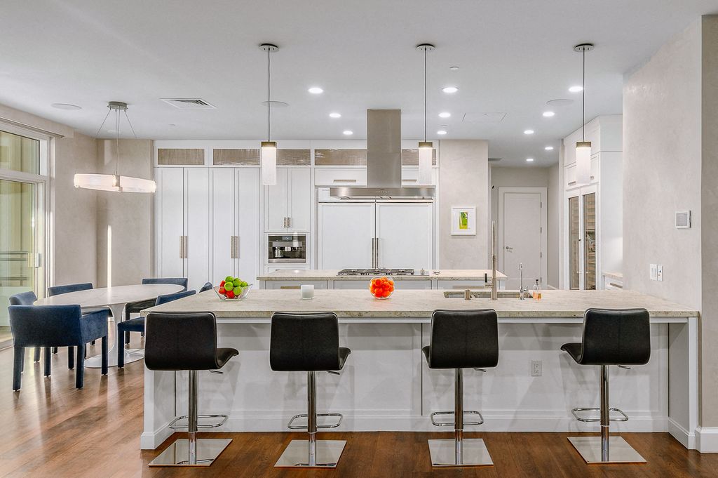 Rihanna has put her luxury LA penthouse at The Century skyscraper - formerly owned by Matthew Perry - back on the market for $25 million just a year after buying it. Pictured: kitchen.