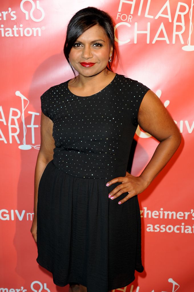 Actress Mindy Kaling arrives at Hilarity For Charity fundraiser benefiting The Alzheimer's Association in a black dress